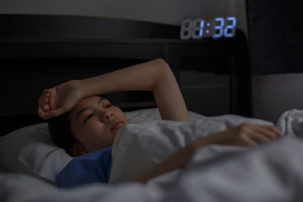 stock photo of a woman who can't sleep